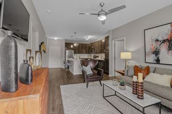 9 Foot ceilings with ceiling fan in living room